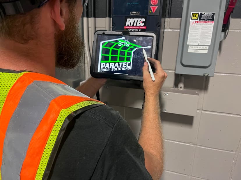 Annual NFPA 80 fire door inspection on a tablet